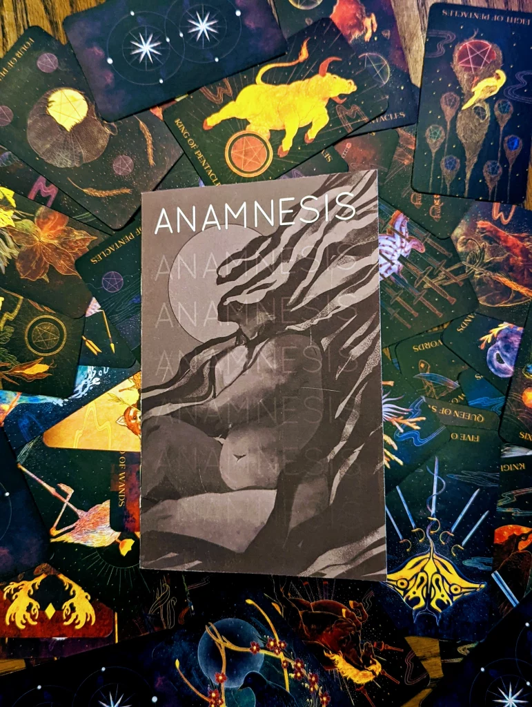 The TTRPG Anamnesis on a deck of cards